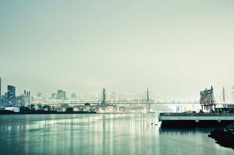 City skyline with bridge at dusk