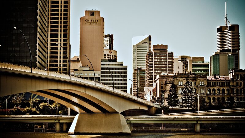 City Skyline with Bridge — Brown