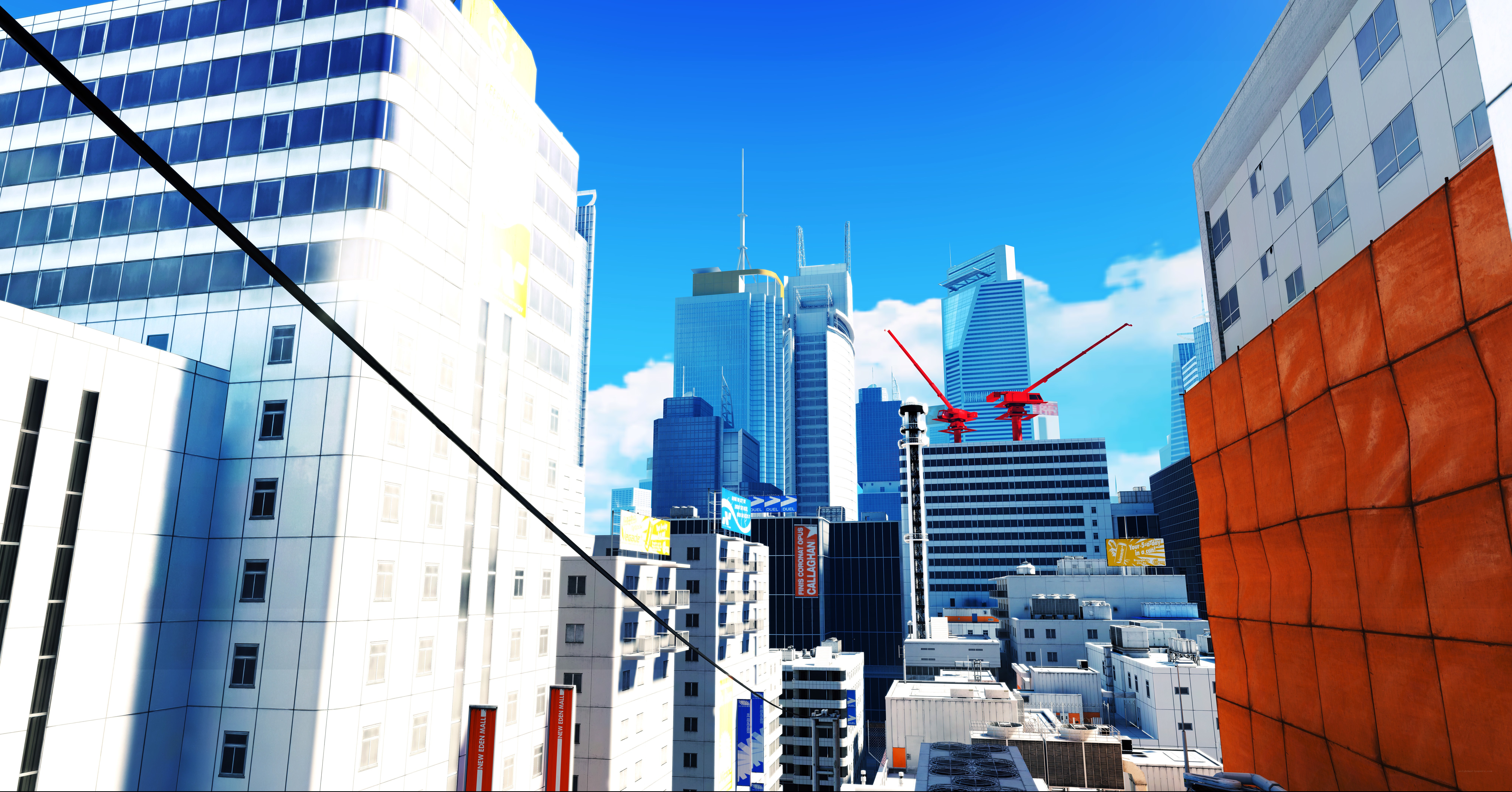 city skyline with cranes
