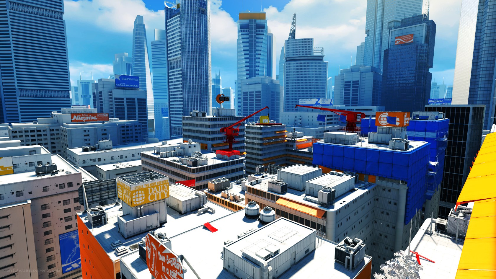 city skyline with cranes