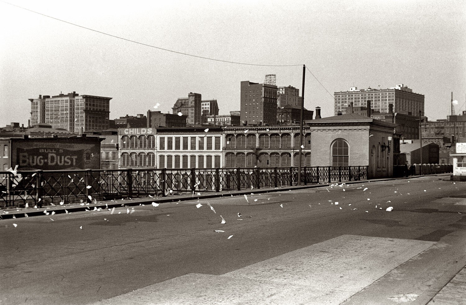 City skyline with debris on bridge