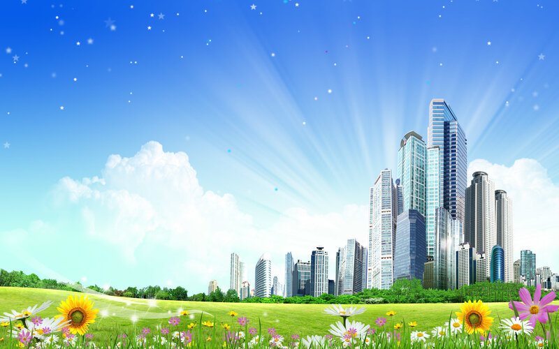 city skyline with green field