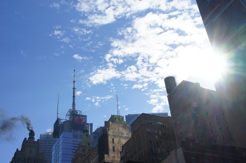 City Skyline with H&M Sign