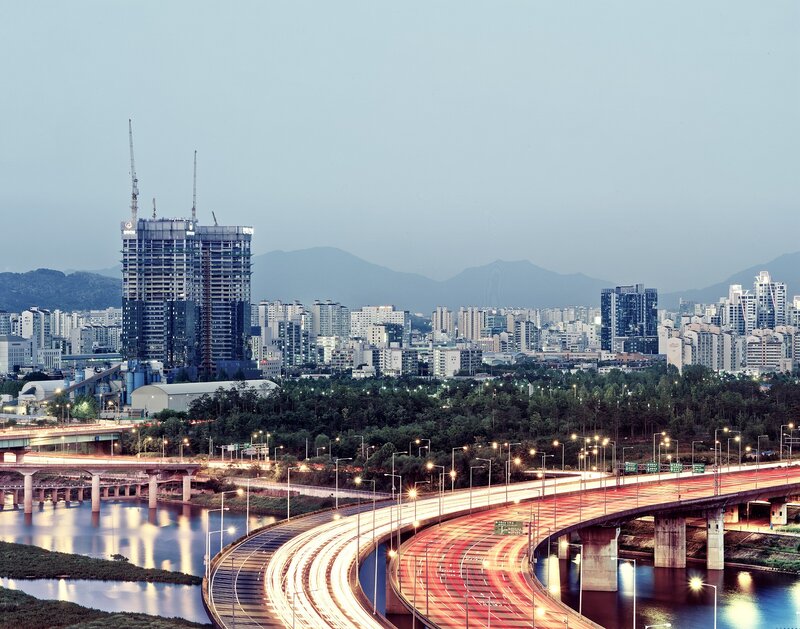 City skyline with highway and river