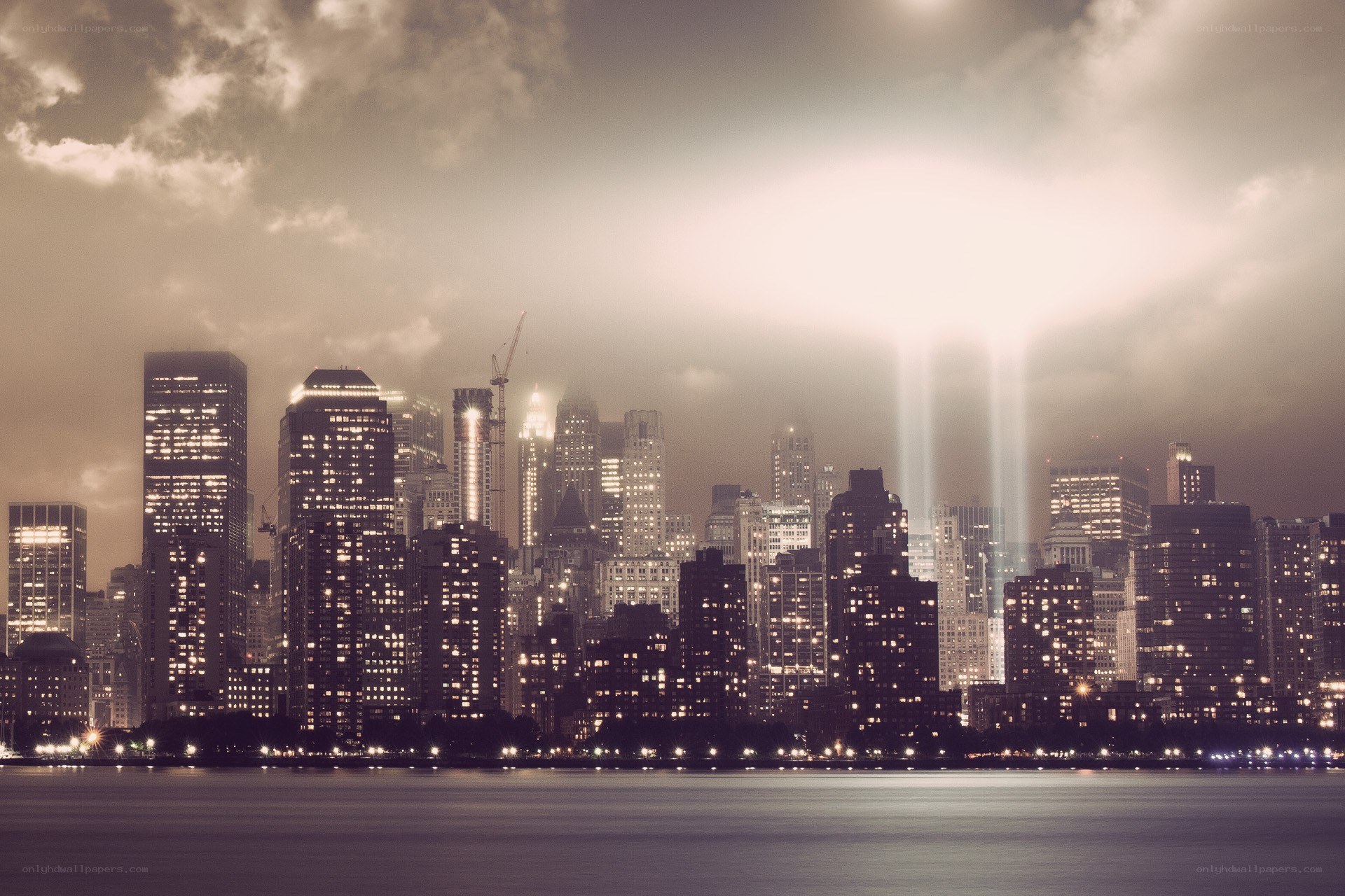 City skyline with light beams