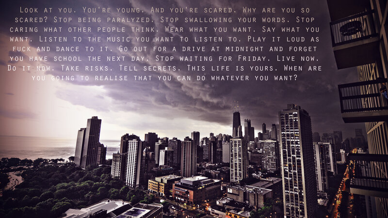 City skyline with motivational quote