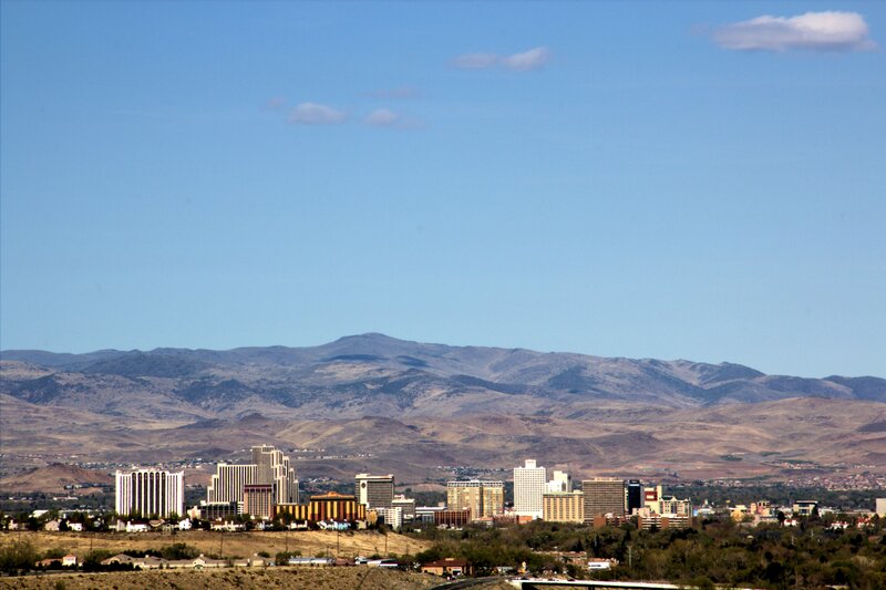 City Skyline with Mountains — Blue