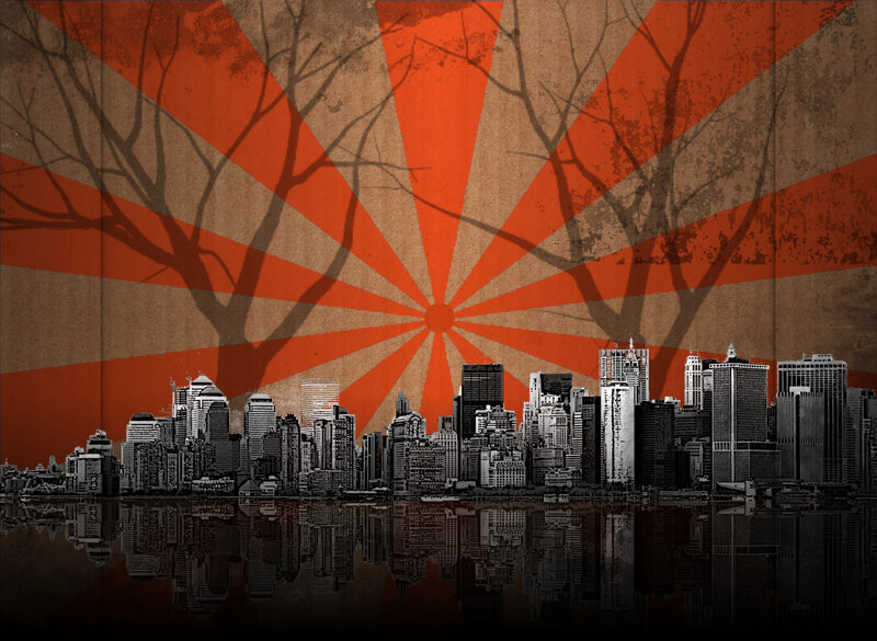 city skyline with orange sunburst