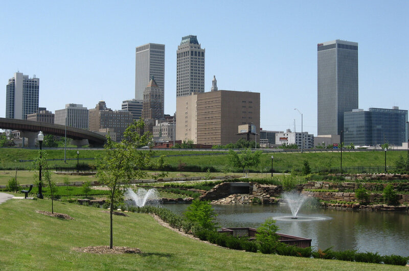 City skyline with park and pond