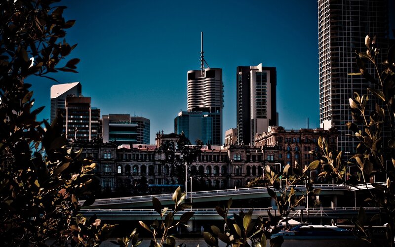 City skyline with river and bridge