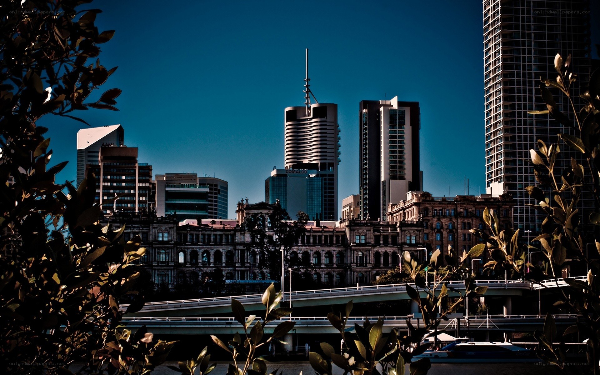 City skyline with river and bridge