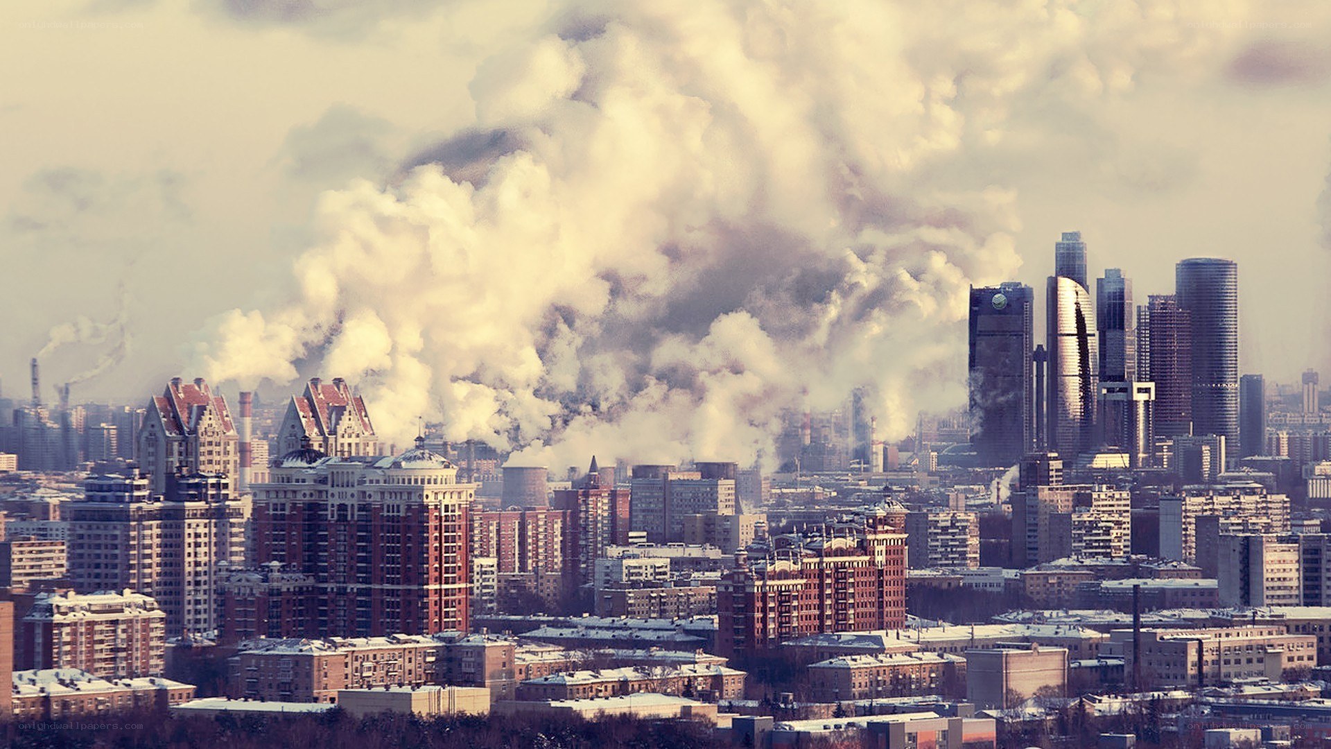 City skyline with smoke