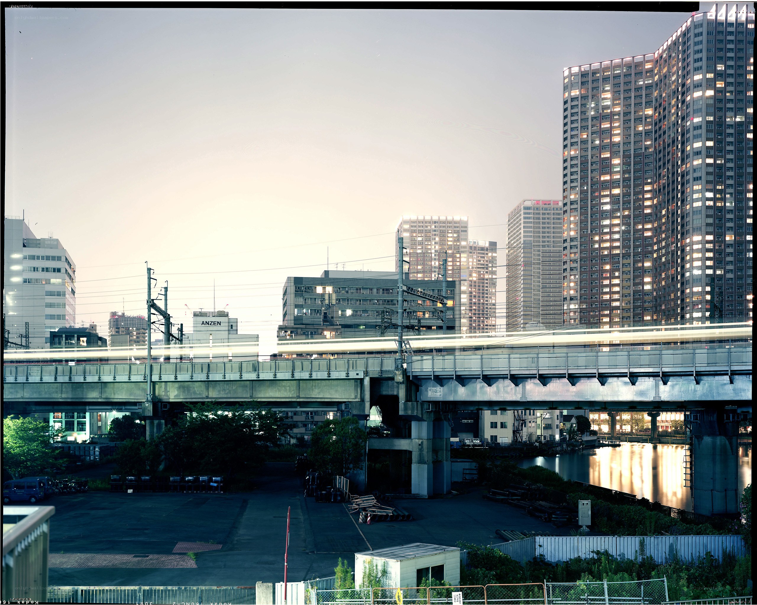 City skyline with train bridge