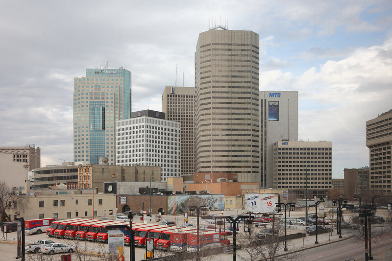 City Skyline with Trucks