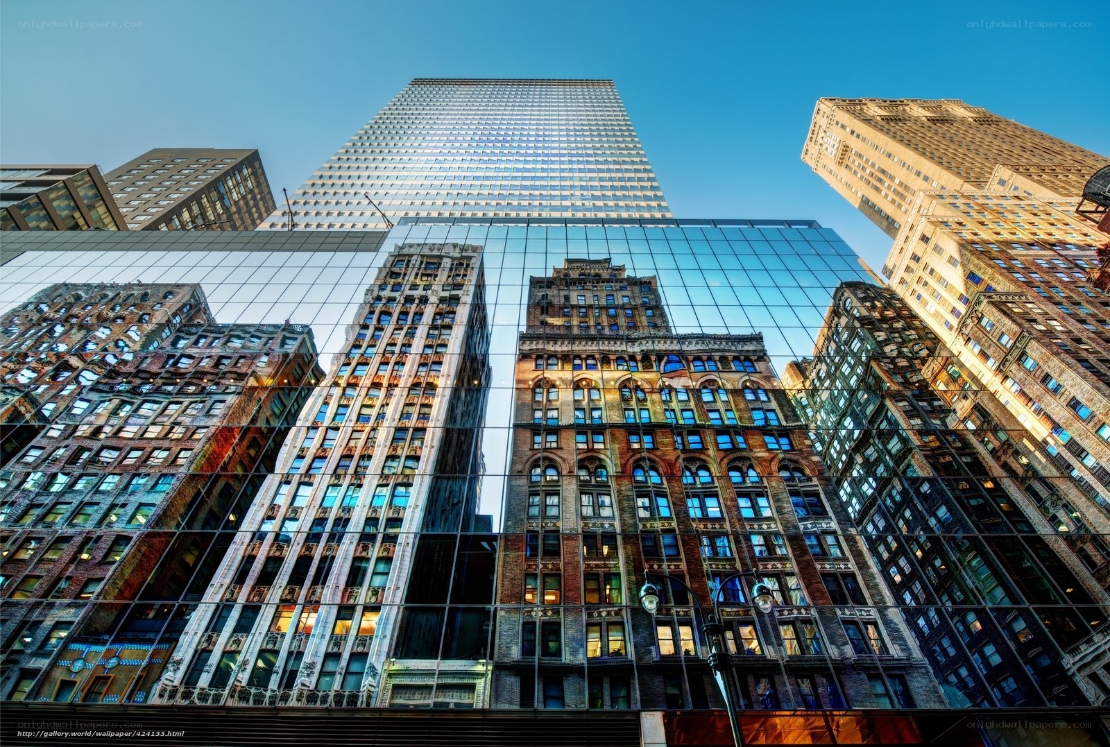 City skyscrapers reflected in glass