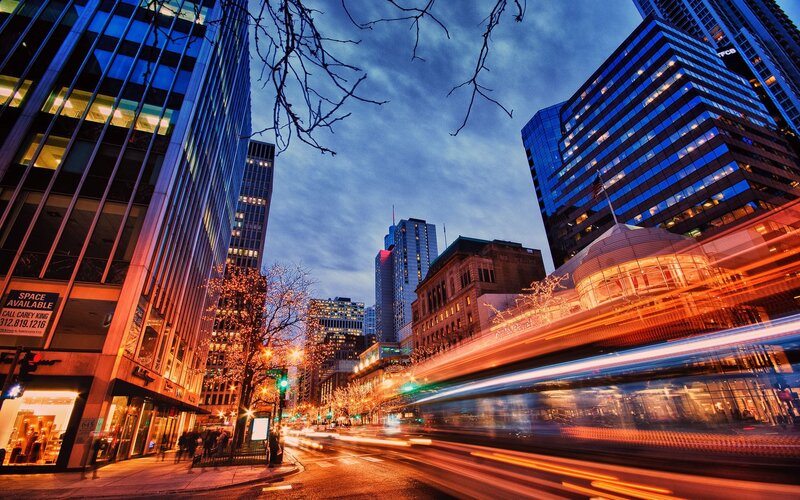 City street at dusk with light trails