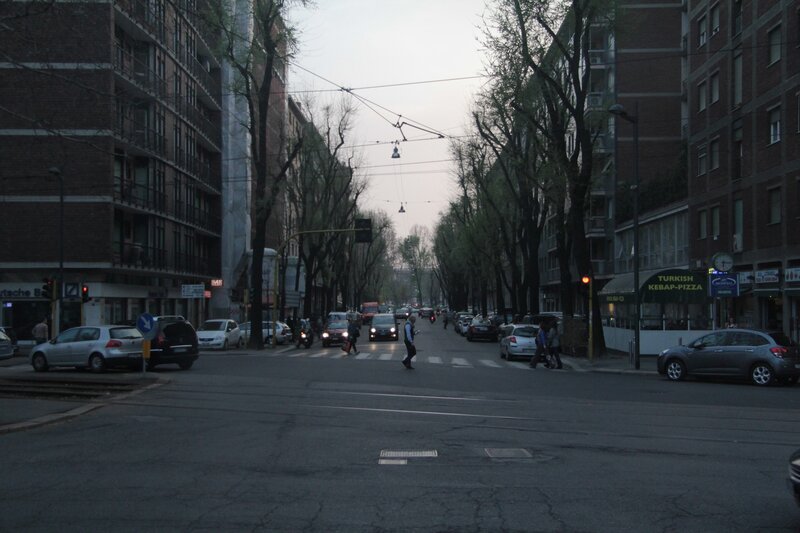 City street at dusk with pedestrians