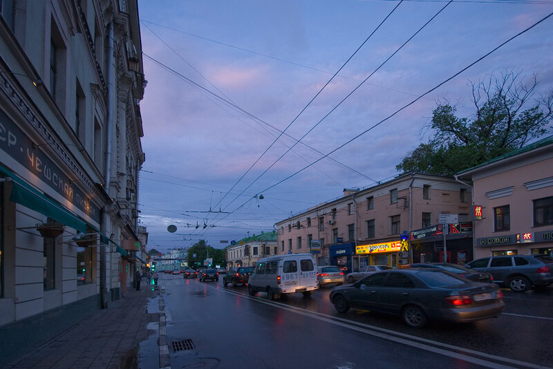 City street at dusk with traffic