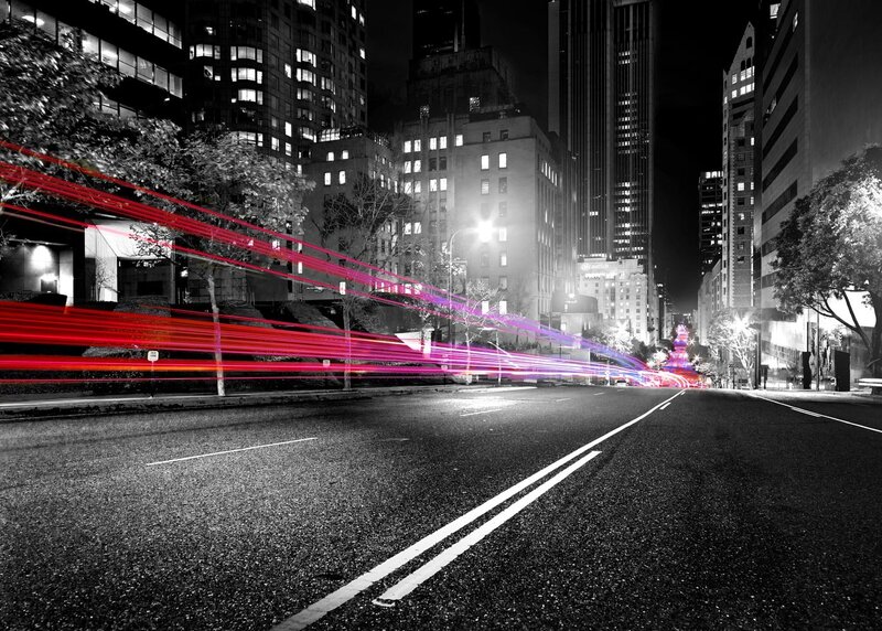City street at night with light trails