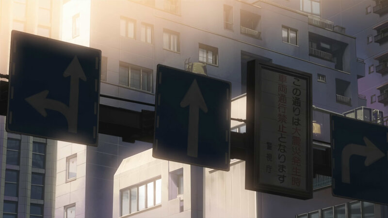 city street signs at sunrise