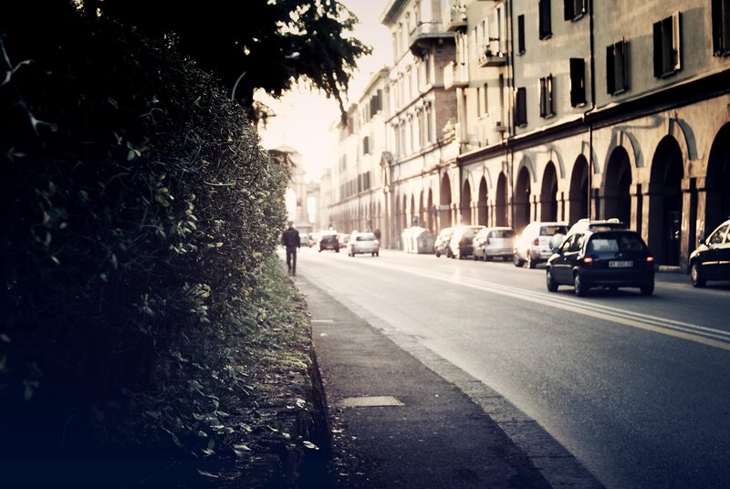 City street with arches and traffic