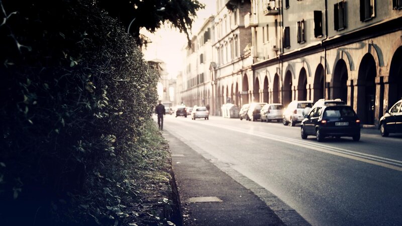 City street with arches and traffic