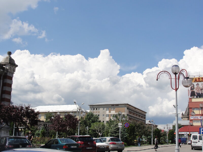 City street with clouds and buildings