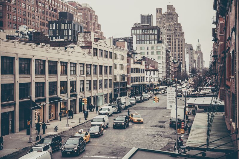 City street with traffic and pedestrians