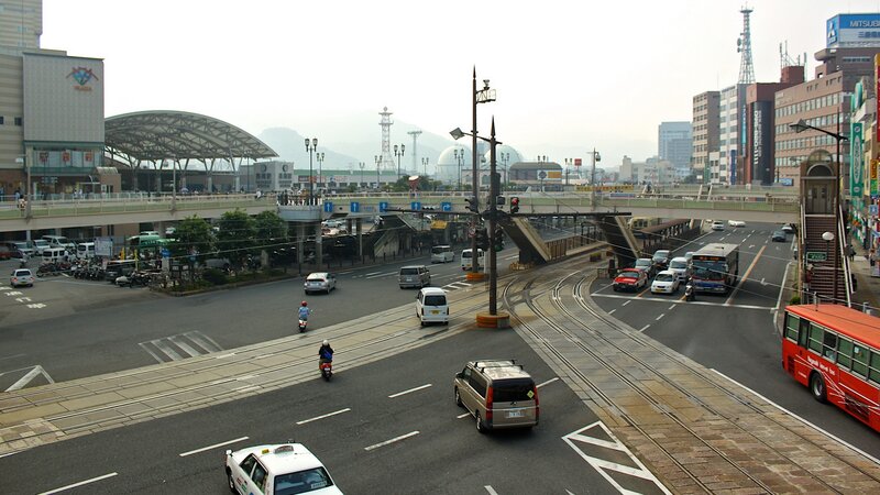 City street with tram tracks and traffic