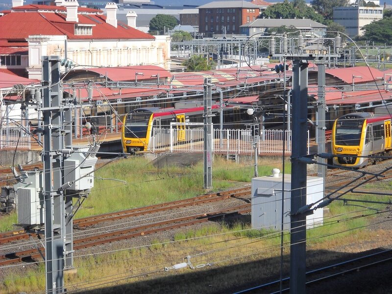 City train station with multiple trains
