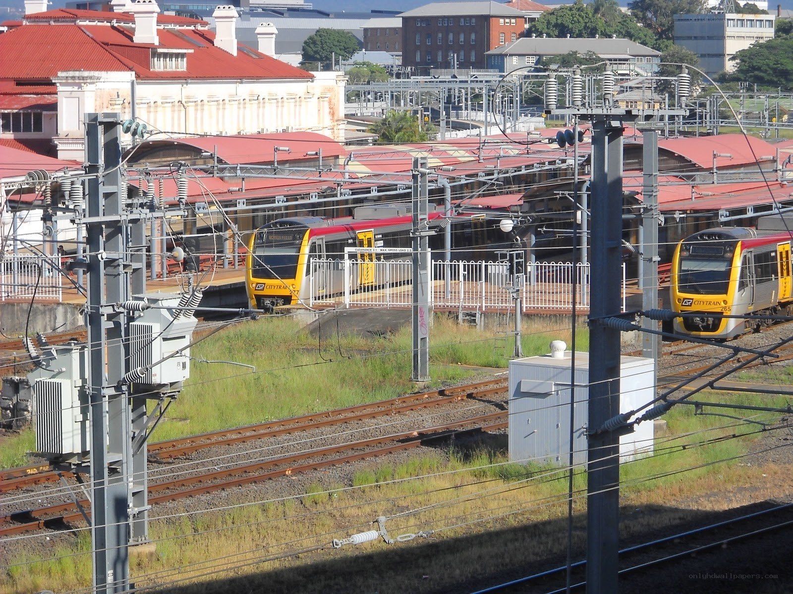 City train station with multiple trains