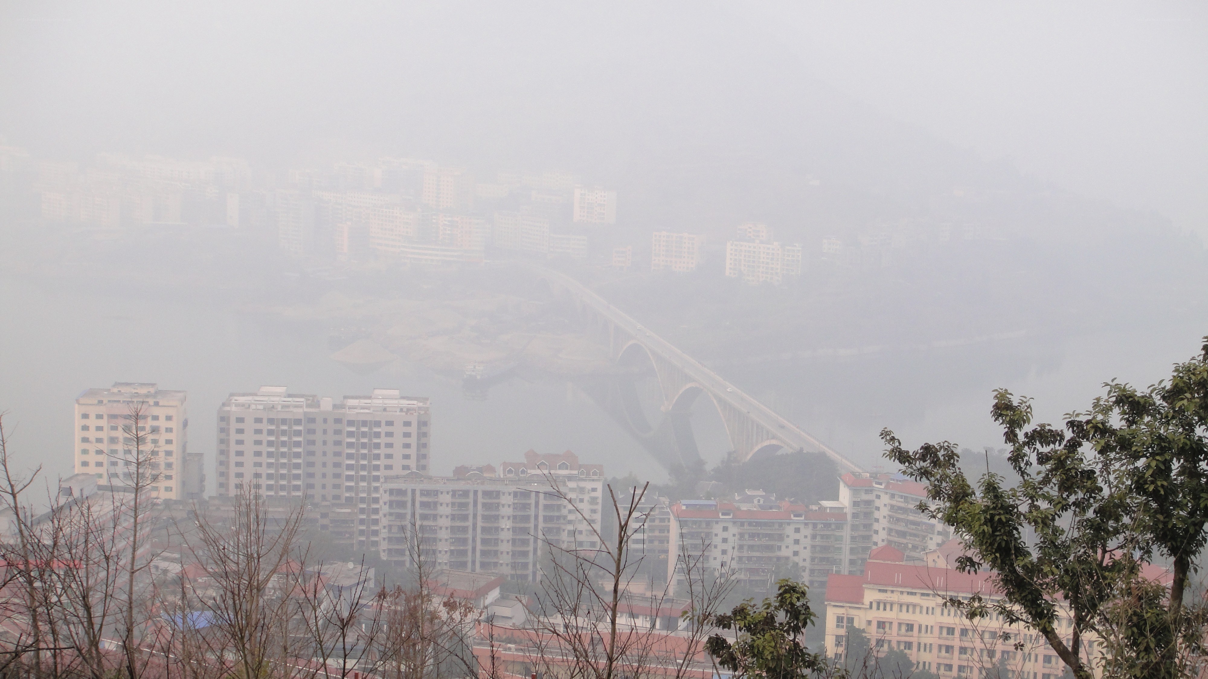 City view through foggy haze