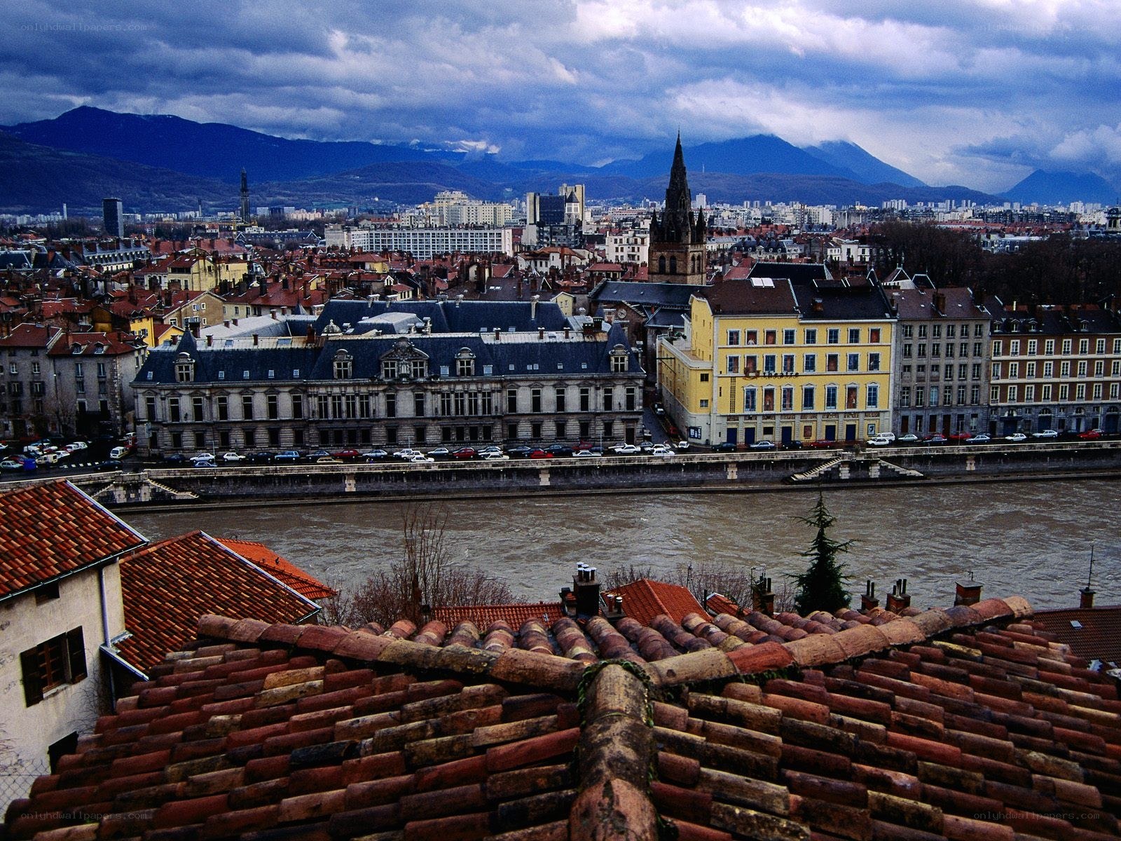 City view with river and mountains
