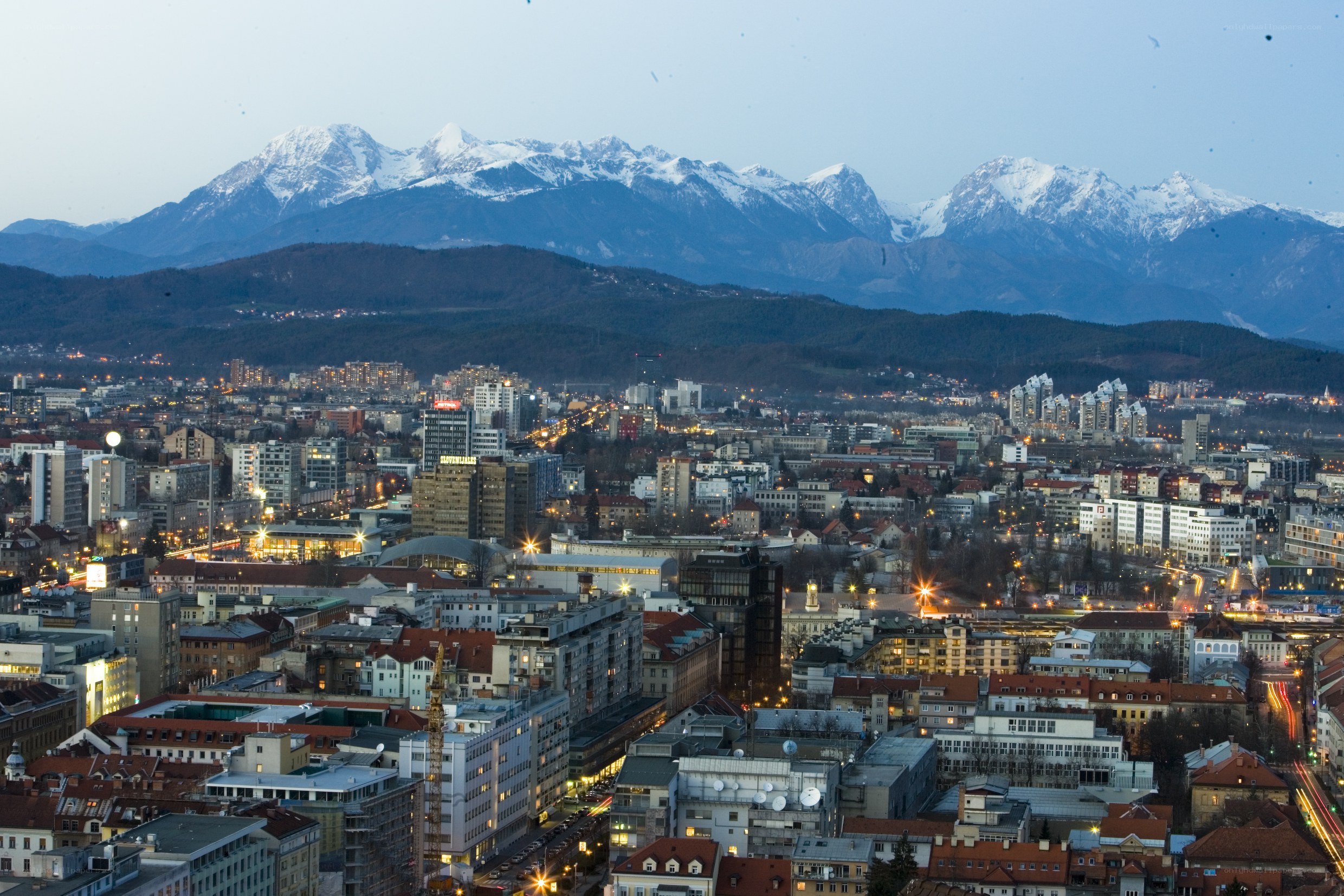 City view with snow-capped mountains