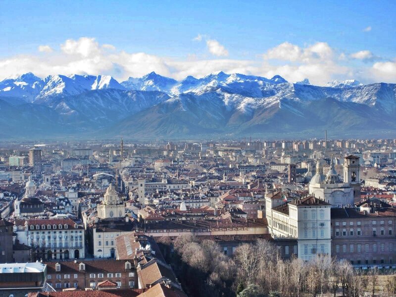 City with Snow-capped Mountains — Blue, Serene, Winter