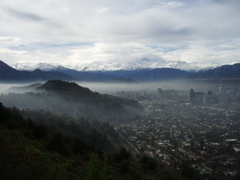 City with snow-capped mountains