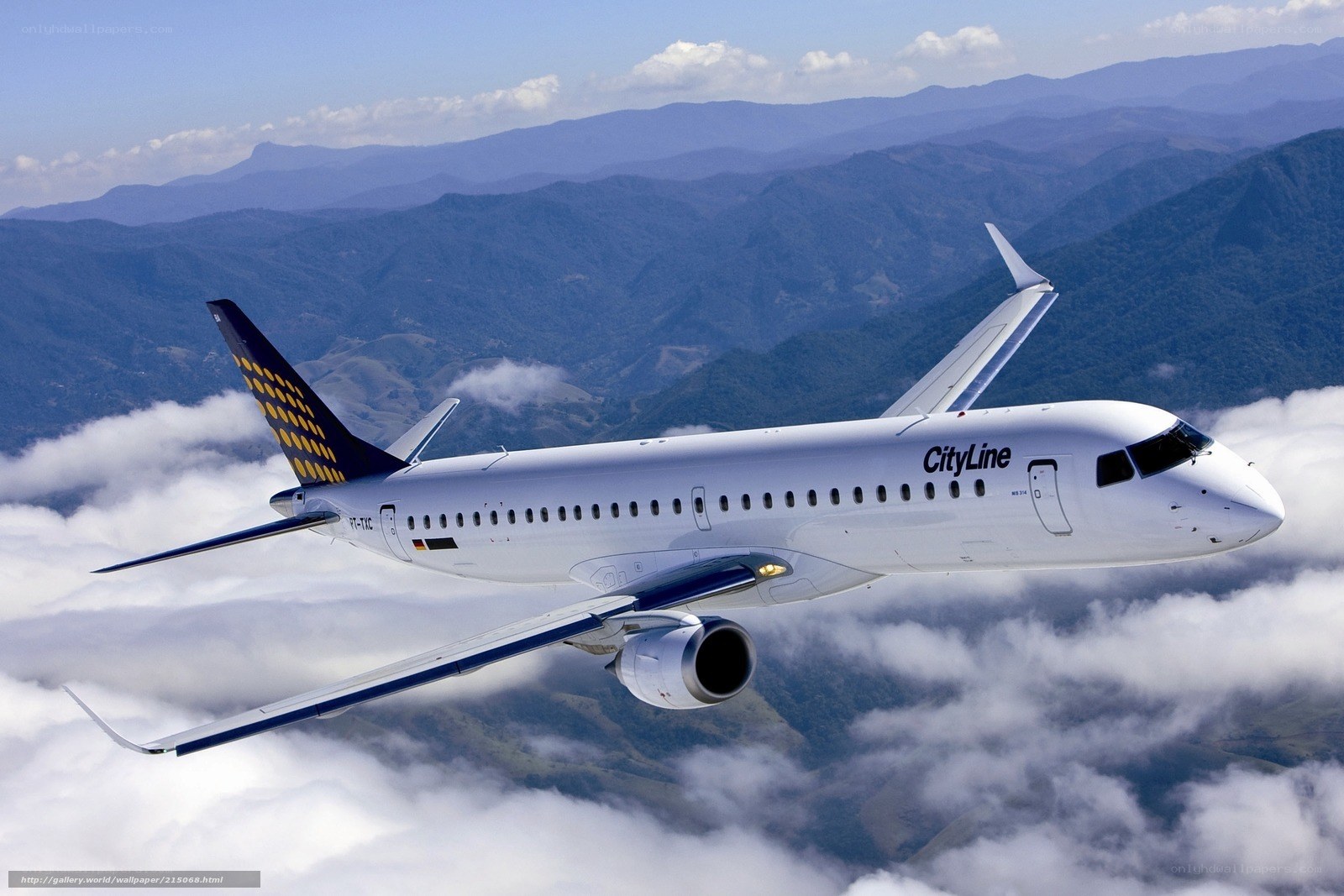 CityLine airplane flying over clouds
