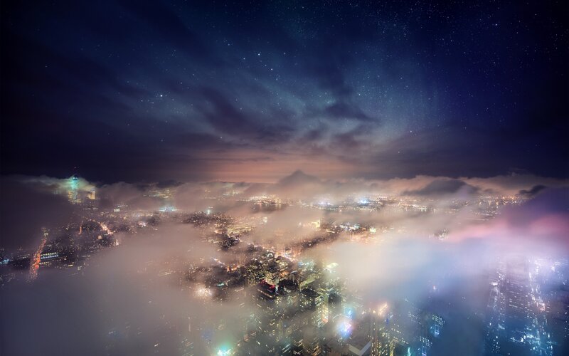Cityscape Above Clouds