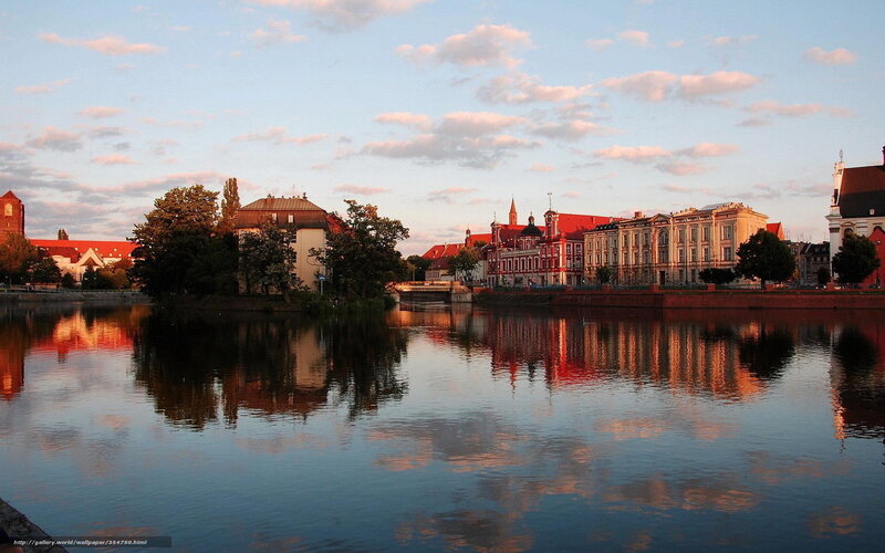 Cityscape Along River — Blue, Serene, Sunset