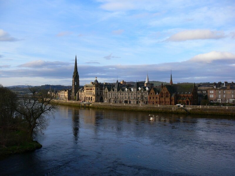 Cityscape Along River — Blue, Serene
