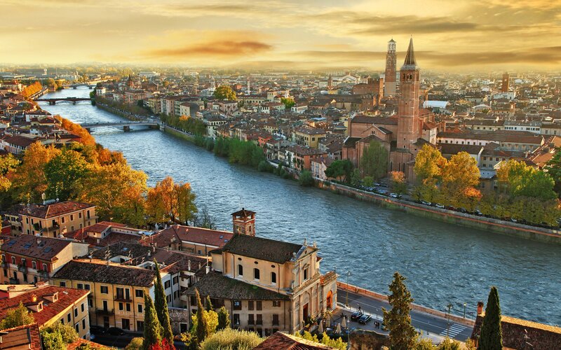 Cityscape Along River — Blue