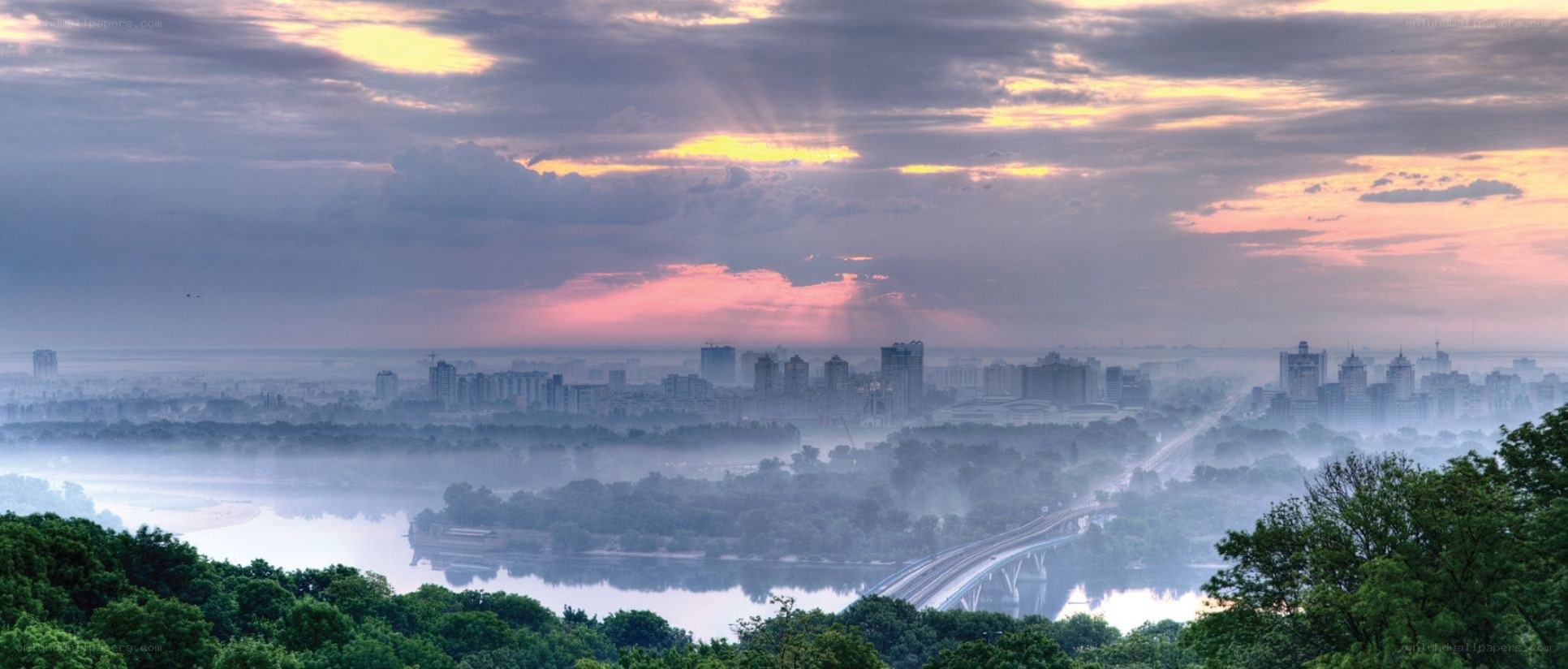 Cityscape at dawn with mist