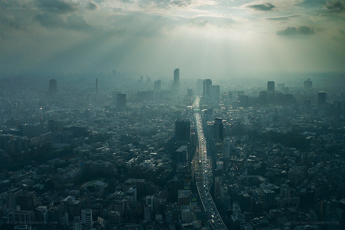 Cityscape at Dawn with Sunbeams