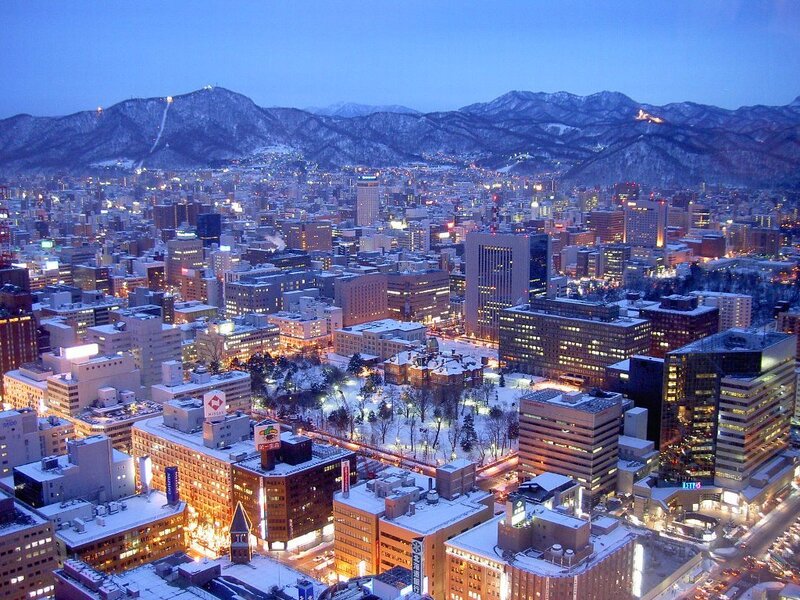 Cityscape at Dusk — Blue, Calm, Night, Photograph, Buildings, Mountains