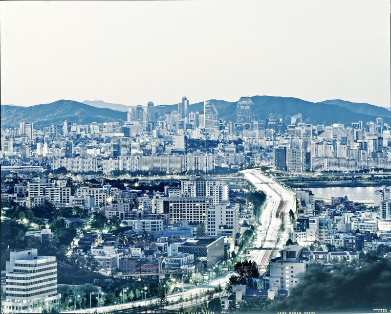 Cityscape at Dusk — Blue, Calm, Night, Photograph, Buildings, River, Mountains