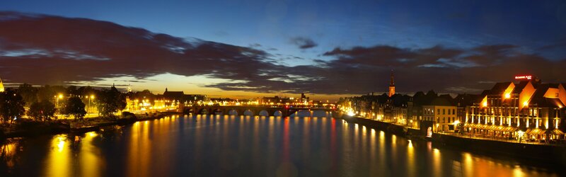 Cityscape at Dusk — Blue, Serene, Night, Photograph, River, Bridge, Buildings