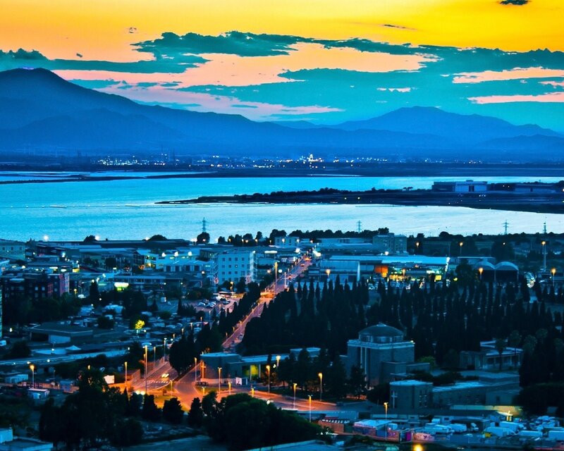 Cityscape at Dusk — Blue, Serene, Sunset, Photograph, Mountains, Lake