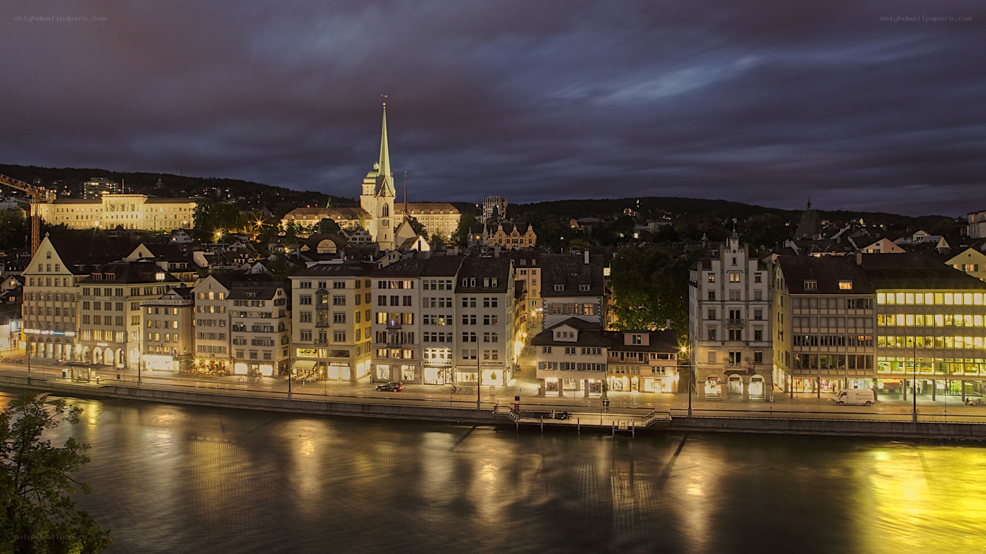 cityscape at dusk by the river