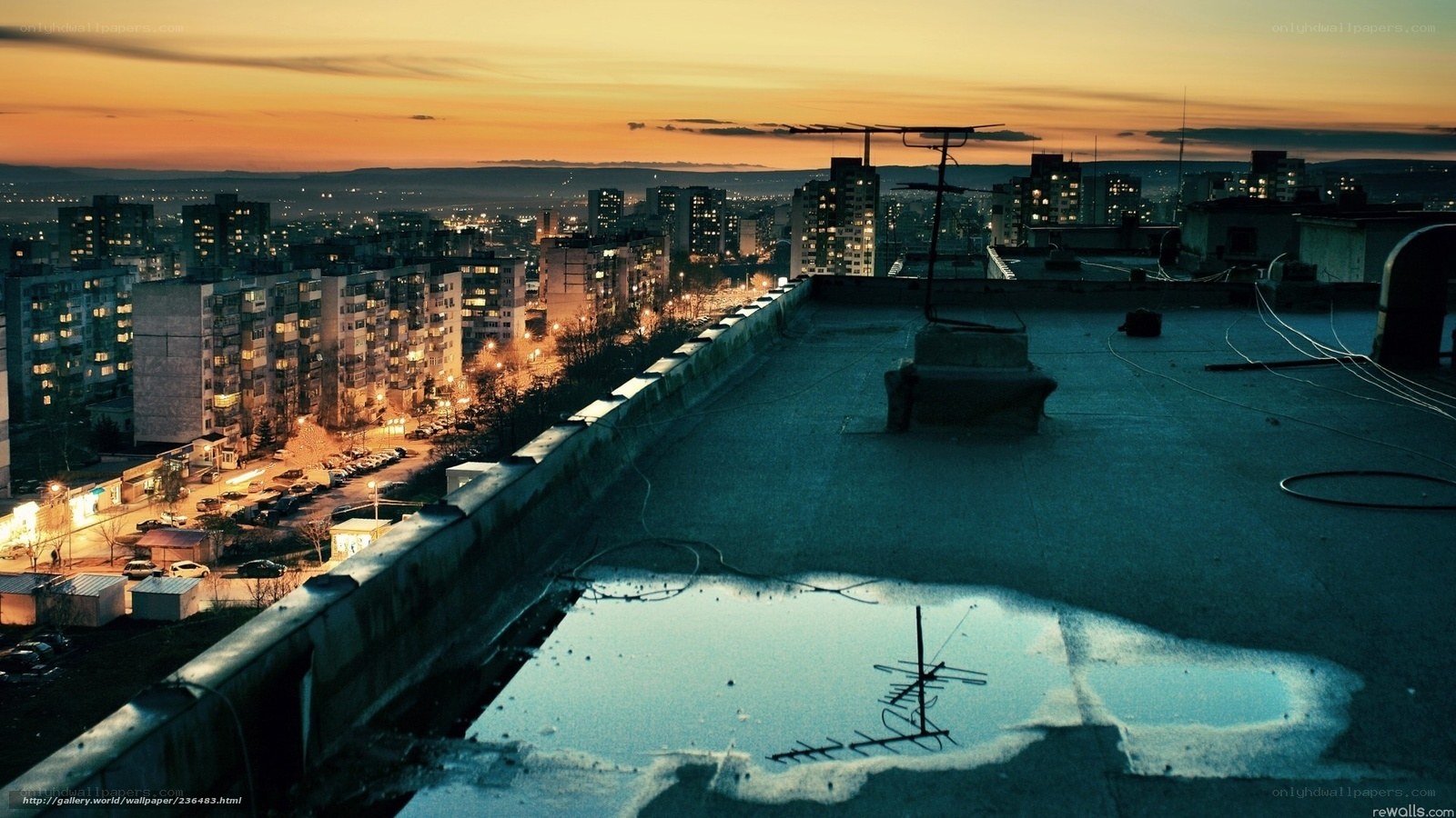 cityscape at dusk from rooftop