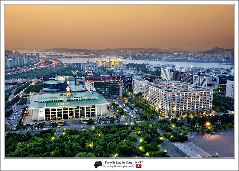 Cityscape at Dusk — Orange, Serene, Sunset, Photograph, Buildings